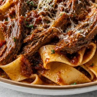 Rich & Hearty Beef Ragu Slow Cooker Magic! Discover the ultimate slow cooker beef ragu recipe. Incredibly tender shredded beef in a rich tomato sauce, perfect w