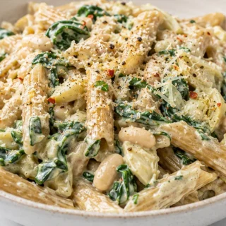 Creamy Spinach Artichoke Pasta Dream - Discover the ultimate creamy Spinach Artichoke Pasta recipe. Quick, easy, and incredibly delicious, perfect for a comfort