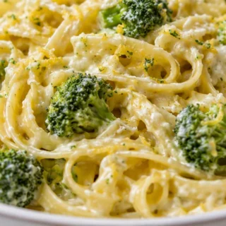 Creamy Broccoli Alfredo Pasta - Broccoli Alfredo: make this surprisingly light and creamy fettuccine dish in under 30 minutes. Perfect for a healthier weeknight