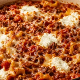 Dutch Oven Lasagna: One-Pot Comfort! Dutch oven lasagna: cook this hearty, cheesy Italian classic in a single pot. Enjoy rich meat sauce, creamy ricotta, and te