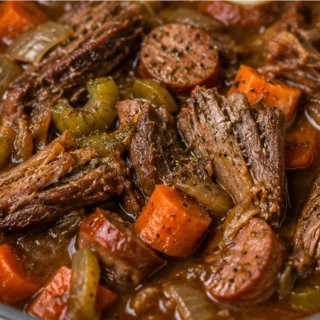 Melt-in-Your-Mouth Pot Roast Sauce - Pot roast: savor this incredibly tender, slow-cooked Sunday sauce. Features a rich tomato base, spicy sausage, and fork-ten