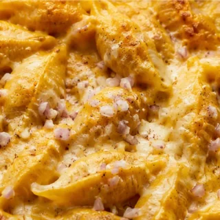 Creamy Pumpkin Gouda Shells: Cozy Fall Dish! Pumpkin Gouda shells: bake this rich, creamy pasta dish with fresh sage and crispy prosciutto. Perfect for a cozy f