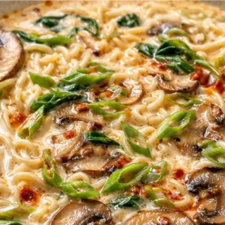 Creamy Vegan Ramen - mushroom ramen - Mushroom ramen: Whip up this incredibly creamy vegan ramen in just 15 minutes! Packed with savory mushrooms and plant-base