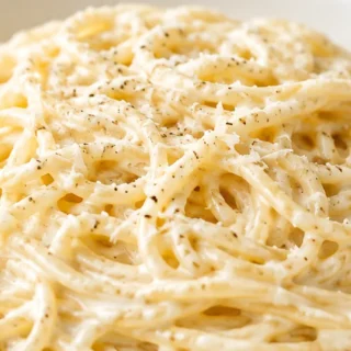 Creamy Parmesan Spaghetti - Parmesan spaghetti: whip up this incredibly creamy, cheesy pasta in just 25 minutes. A simple, satisfying one-pan meal perfect for a