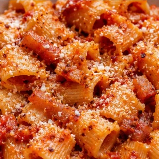 The ONLY Pasta Amatriciana You'll Ever Need! Master authentic Pasta all'Amatriciana with this easy recipe. Features crispy guanciale, San Marzano tomatoes, and