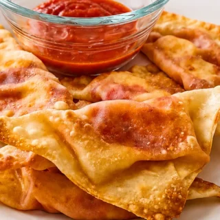 Viral Pizza Gyoza: The Ultimate Party Hack! Pizza Gyoza: Bake these fun, crispy appetizers filled with mozzarella and pepperoni. An easy, crowd-pleasing party s