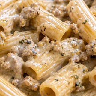 Easiest Creamy Rigatoni Recipe! Rigatoni recipe: Make this easy creamy one-pan dish with ground turkey and zucchini. Perfect for a quick weeknight meal, with a