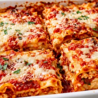 Ricotta Lasagna Comfort Food - Ricotta lasagna: Bake this ultimate creamy and cheesy Italian classic in under an hour. Layers of rich marinara, smooth ricotta,
